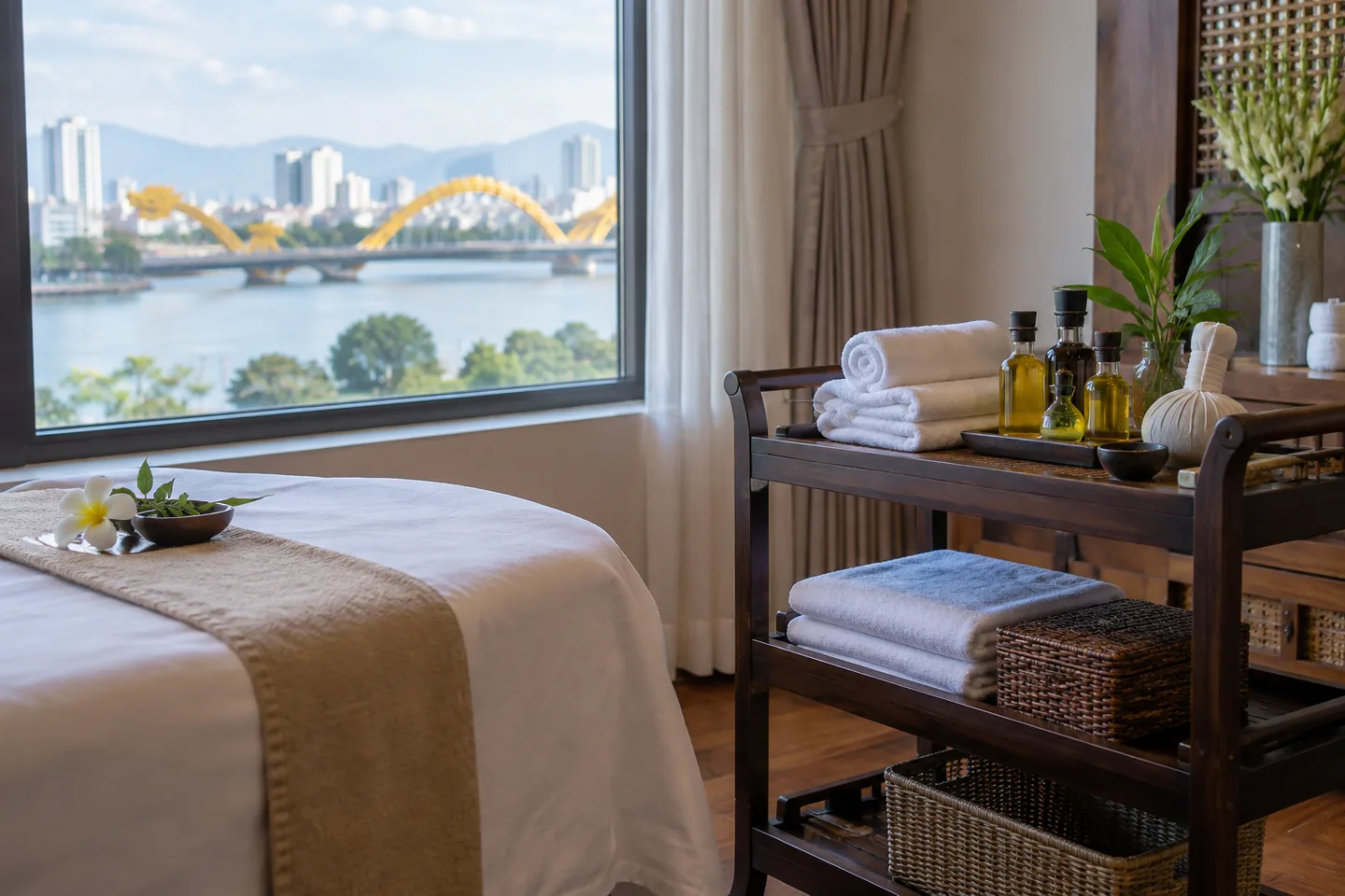 Fresh towels and oil beside a full body massage table